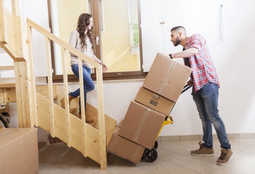 Modern moving team using technology and eco-friendly materials