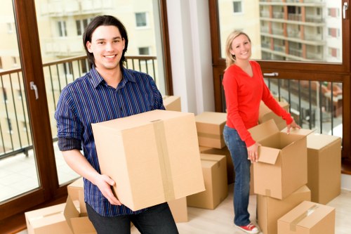 Professional movers handling items with care in West Hampstead